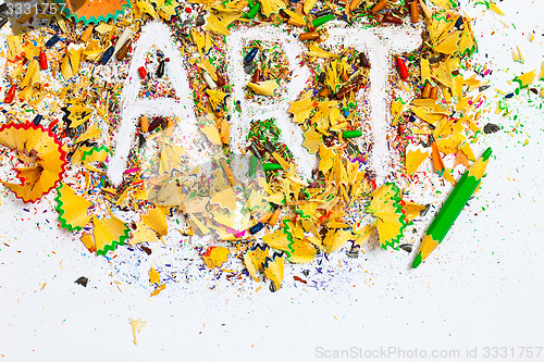 Image of word Art over a shavings of pencils for drawing