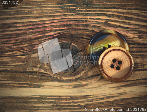 Image of two vintage buttons