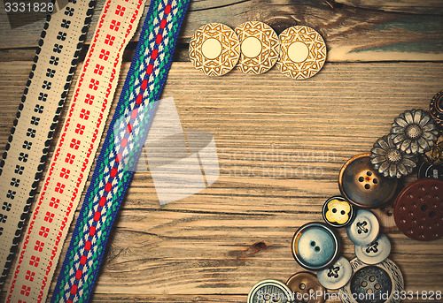 Image of vintage buttons and ancient ribbons