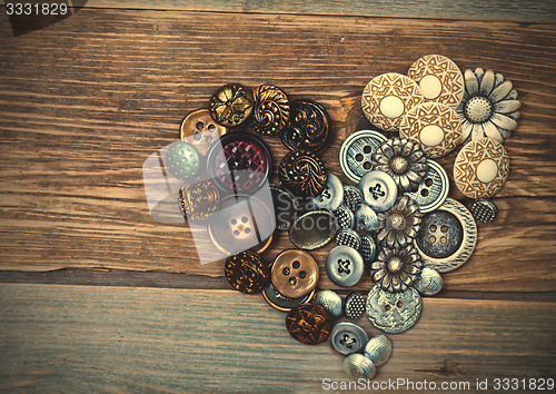 Image of Heart from old classical buttons