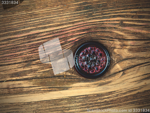 Image of one vintage leather button