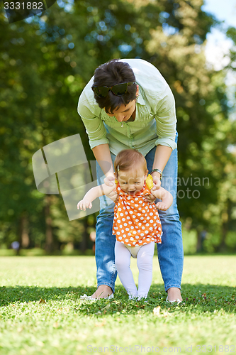 Image of mother and baby in park