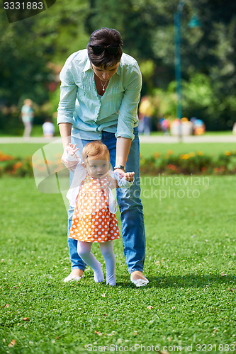 Image of mother and baby in park