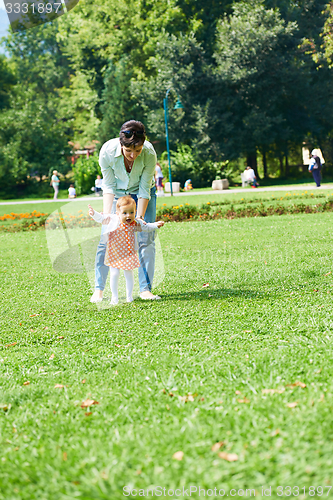 Image of mother and baby in park
