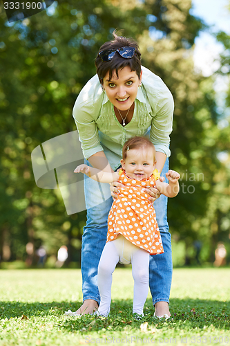 Image of mother and baby in park