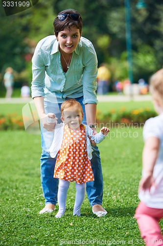 Image of mother and baby in park