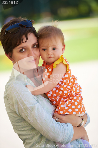 Image of mother and baby in park
