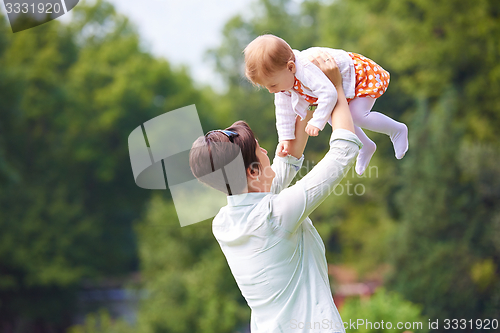 Image of mother and baby in park