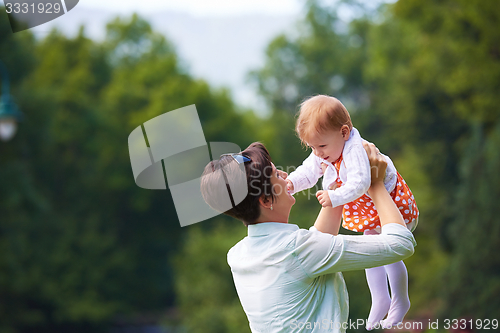 Image of mother and baby in park