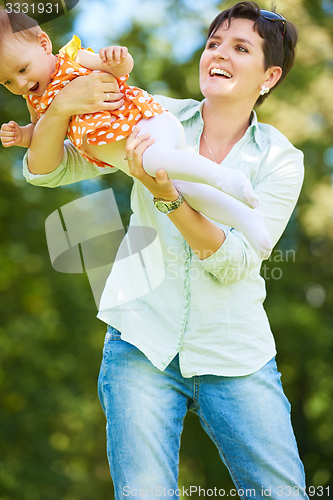 Image of mother and baby in park