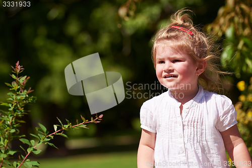 Image of little girl have fun in park