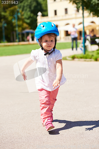 Image of little girl have fun in park