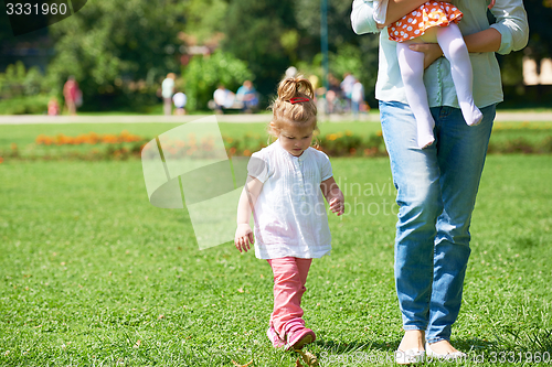 Image of little girl have fun in park