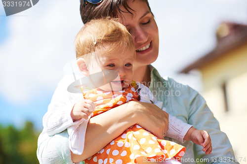 Image of mother and baby in park