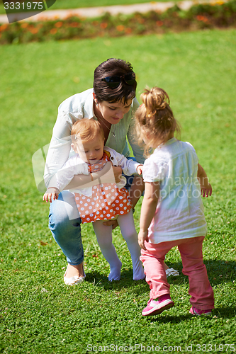 Image of mother and baby in park