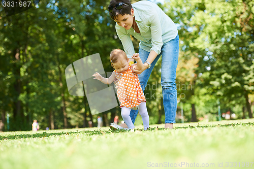Image of mother and baby in park