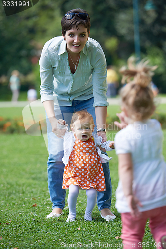 Image of mother and baby in park