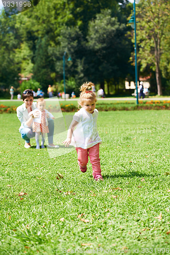 Image of mother and baby in park