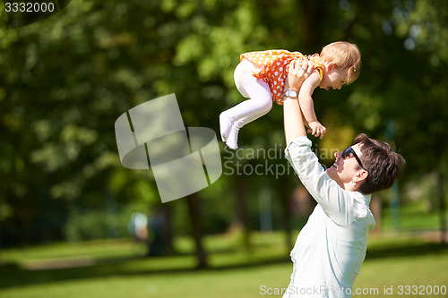Image of mother and baby in park