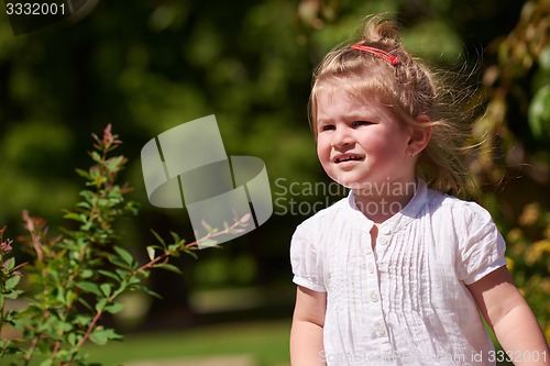 Image of little girl have fun in park
