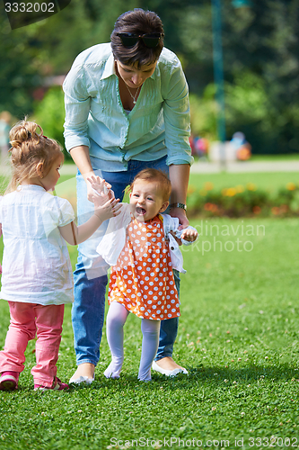 Image of mother and baby in park