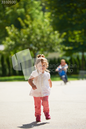 Image of little girl have fun in park