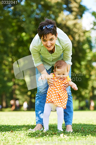 Image of mother and baby in park