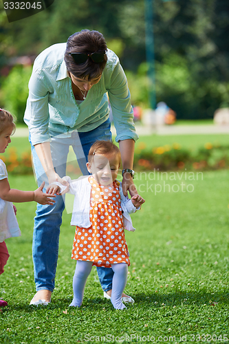 Image of mother and baby in park