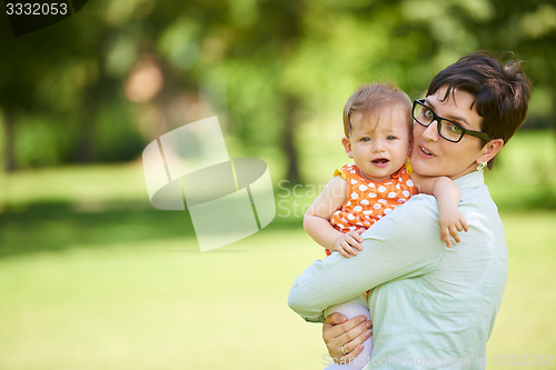 Image of mother and baby in park