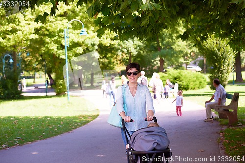 Image of mother and baby in park