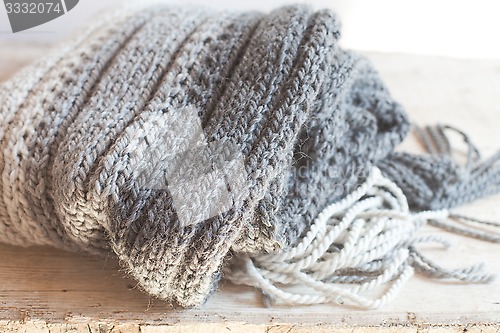 Image of wool grey scarf with tassels 