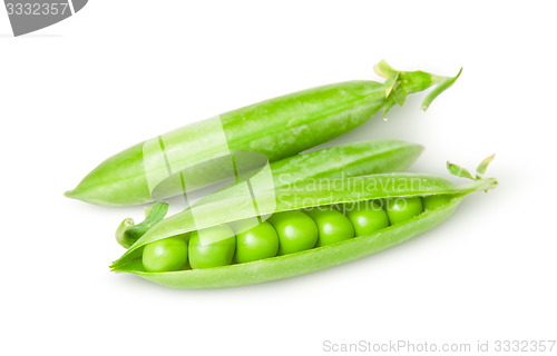 Image of Three green peas in pods