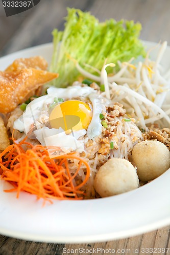 Image of Thai Noodle Dish with Fried Egg