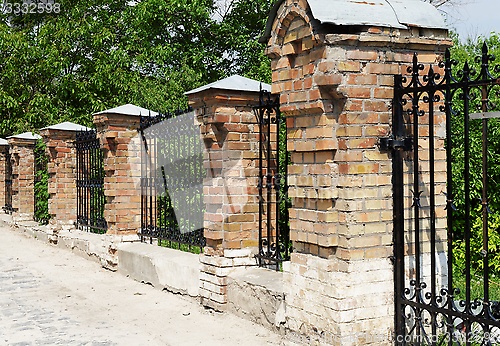 Image of Brick and metal fence in Kiev Pechersk Lavra Monastery in Kiev, Ukraine