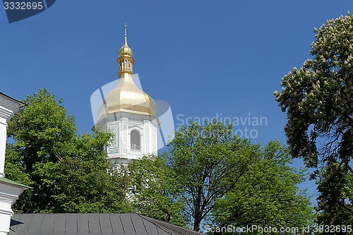 Image of Belfry of the Sophia's Cathedral in Kiev, Ukraine, above the trees