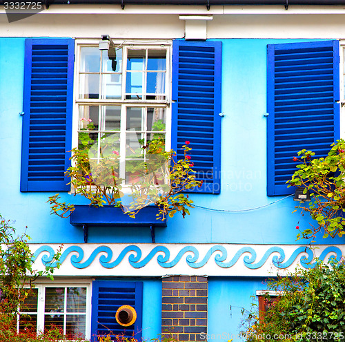 Image of notting   hill  area  in london england old suburban and flowers