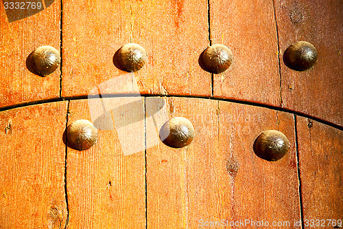 Image of metal nail dirty stripped   in the brown   red  