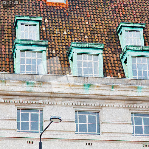 Image of old windon in england london brick roof tile