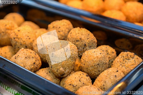 Image of ruddy crispy cheese balls with spices