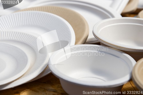 Image of paper disposable plates of different colors