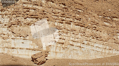 Image of Texture of an orange weathered rock in the desert