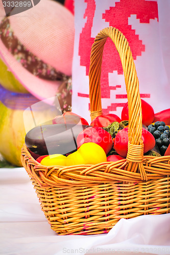Image of The beautiful basket with vegetables, fruit is on sale at fair.