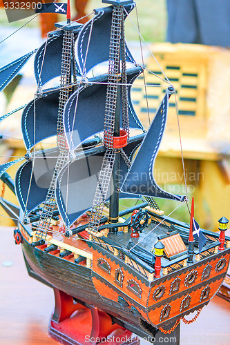 Image of The model of a sailing vessel is photographed by a close up