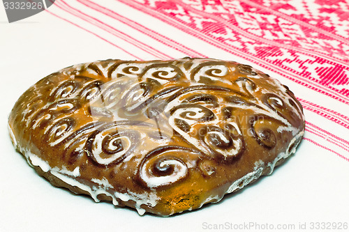 Image of Beautiful cake on a white towel. Sold at the fair.