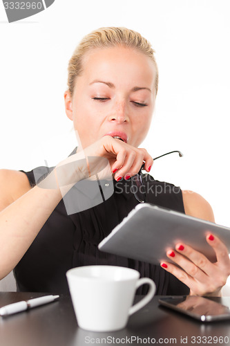 Image of Business woman yawning.