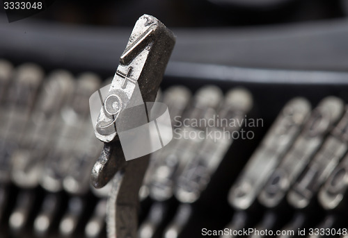 Image of 9 hammer - old manual typewriter