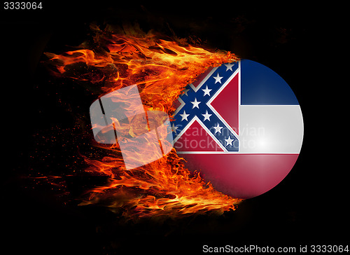 Image of US state flag with a trail of fire - Mississippi