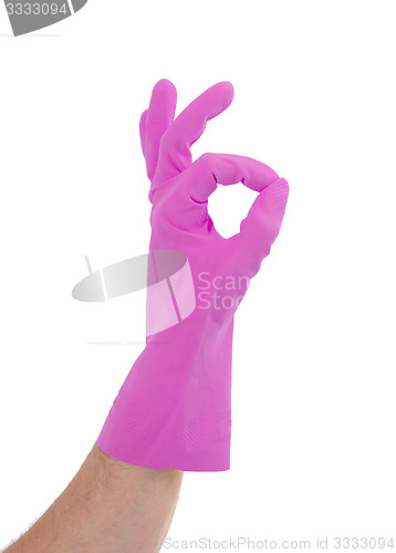 Image of Hand gesturing with pink cleaning product glove