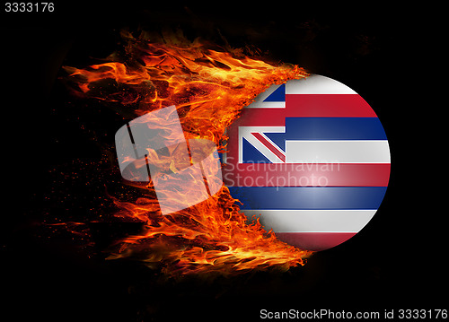 Image of US state flag with a trail of fire - Hawaii