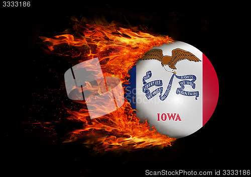 Image of US state flag with a trail of fire - Iowa